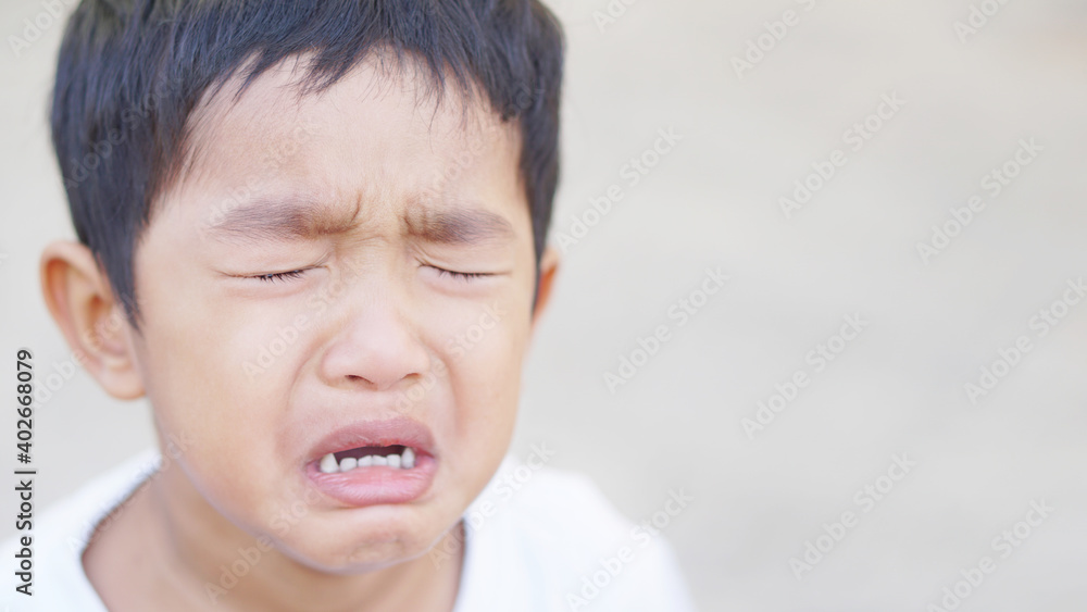 Asian boy about 3 year old unhappy boy crying face he feel so sad concept. Asian boy about 3 year old unhappy boy crying face he feel so sad concept.