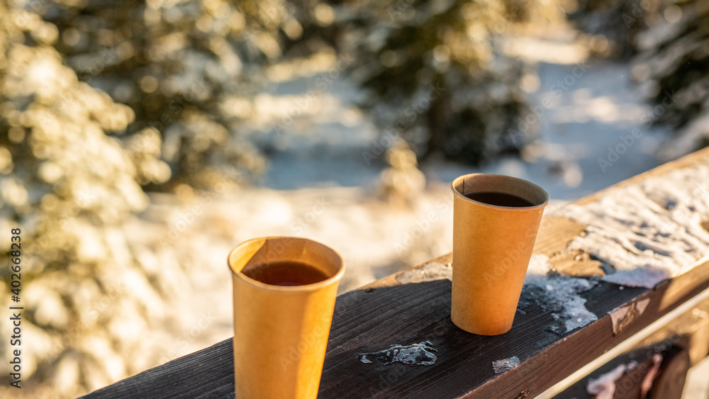 mulled wine - mulled wine in an ecological mug on the ski slope
