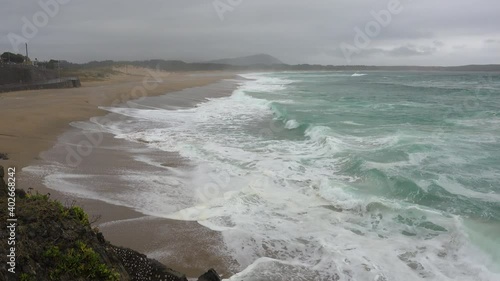 Brave sea with the waves beating the rocks of the Valdoviño beach. Galicia photo