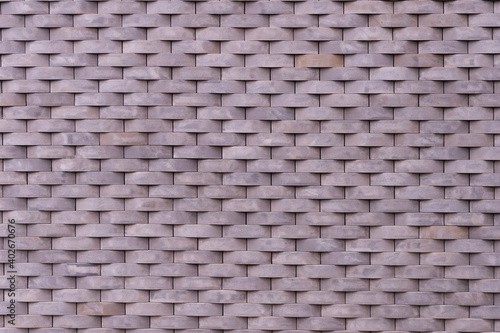 Grey brick wall texture background. Tiled.