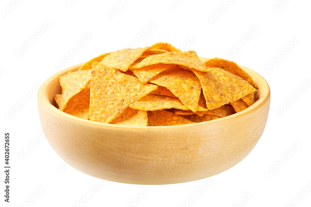 corn tortilla chips or nachos on a wooden plate isolated on a white background. corn tortilla chips or nachos on a wooden plate isolated on a white background.
