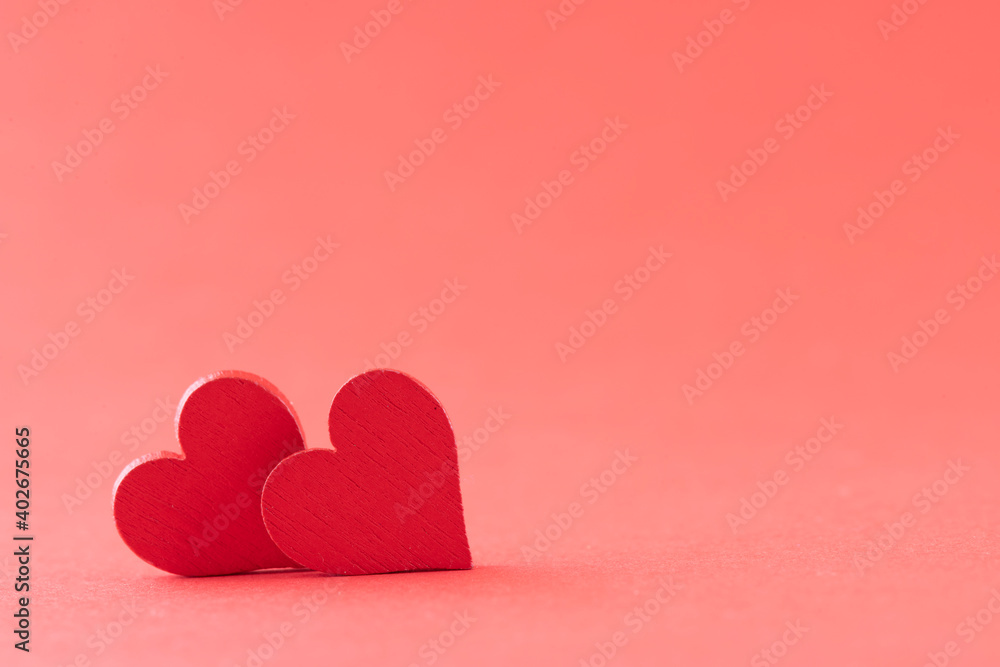 Hearts of fabric on a red background. Time for lovers' day, Valentine's day.