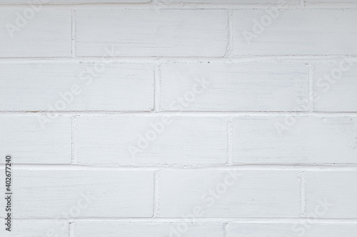 A brick wall painted white