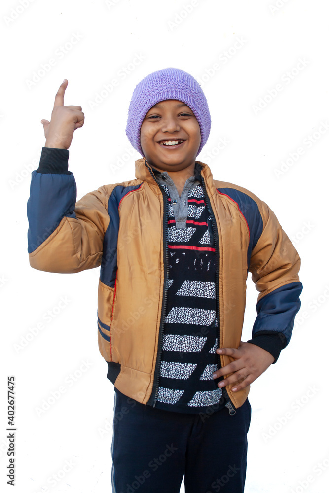 Portrait of boy Pointing while wearing warm clothing during winter Portrait of boy Pointing while wearing warm clothing during winter