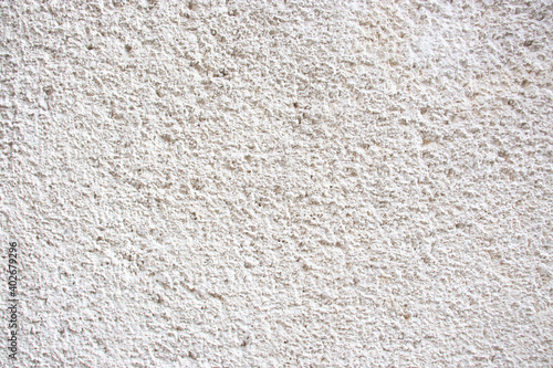 Decorative plaster texture. Whitewash wall background. photo