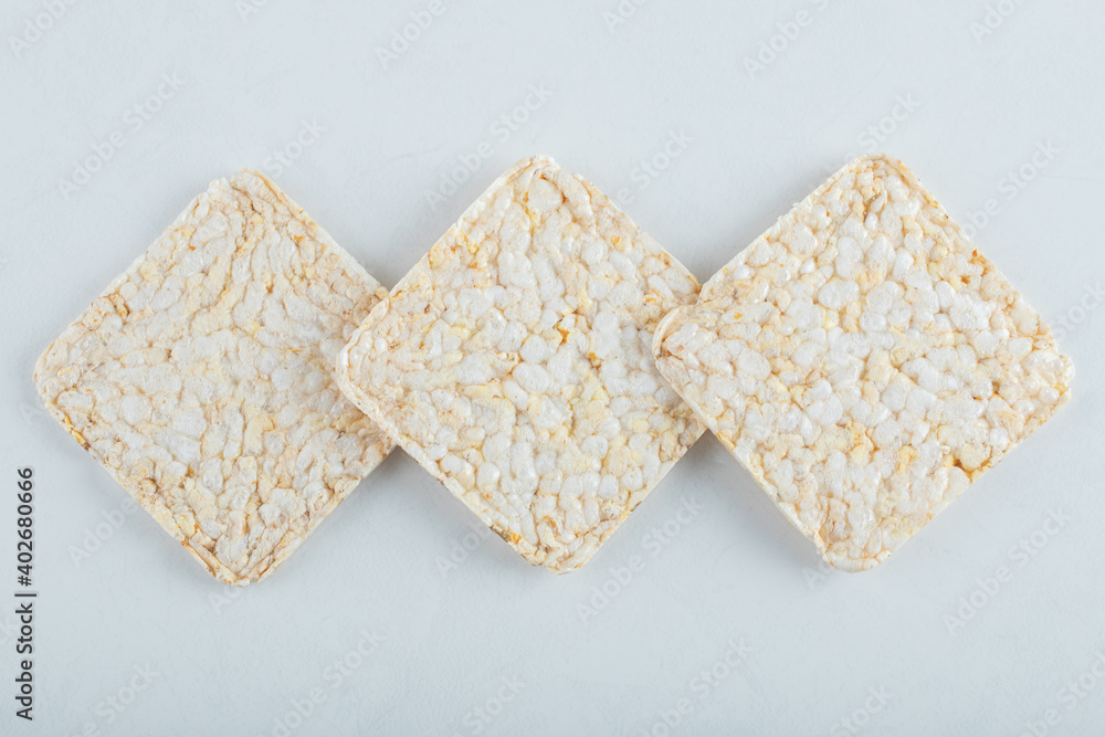 Delicious airy crispbread on white background Delicious airy crispbread on white background