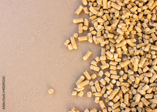 wooden pellets background, pattern. Wood pellets on a blank brown background, free copy space. flat lay