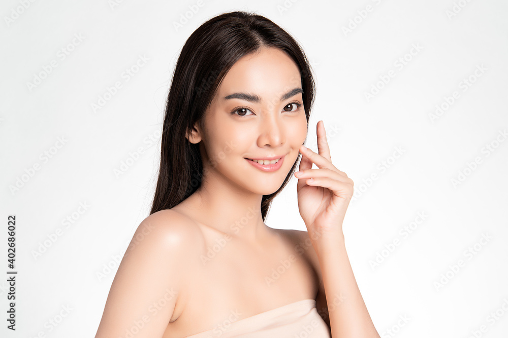 Beautiful Young asian Woman with Clean Fresh Skin, on Pink background, Face care, Facial treatment. Cosmetology, beauty and spa. Asian women portrait Beautiful Young asian Woman with Clean Fresh Skin, on Pink background, Face care, Facial treatment. Cosmetology, beauty and spa. Asian women portrait