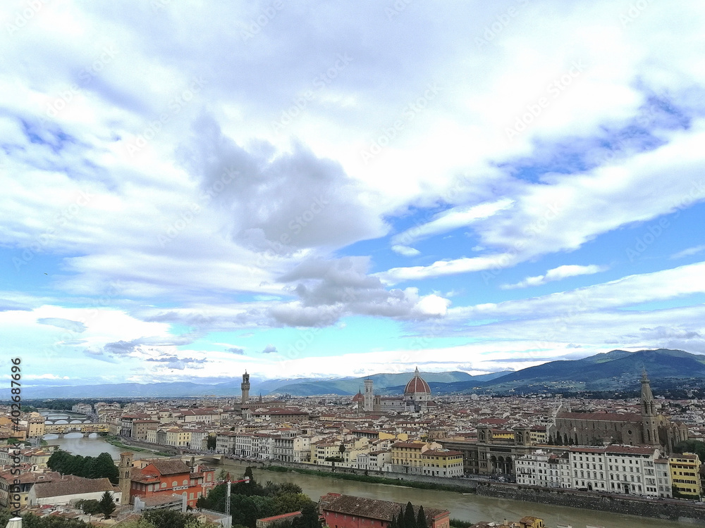 view of Florence from above. Arno river, cathedral, roofs, tower, chapel, bell tower, old bridge,