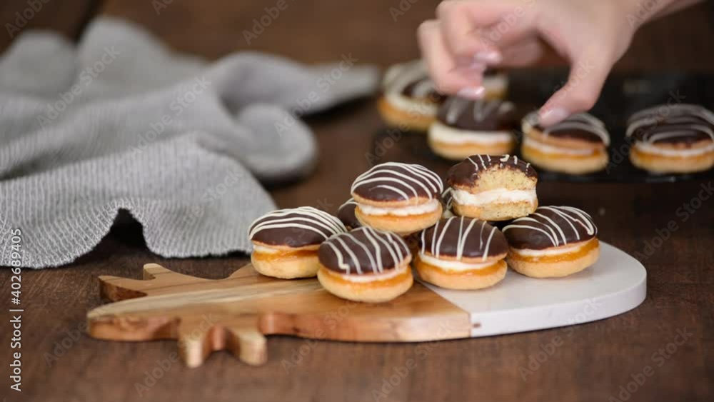 Fresh pastries cakes Boucher with chocolate icing. Fresh pastries cakes Boucher with chocolate icing.