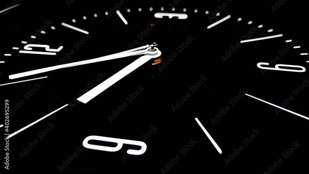 movements of analog black face clock in real time movements of analog black face clock in real time