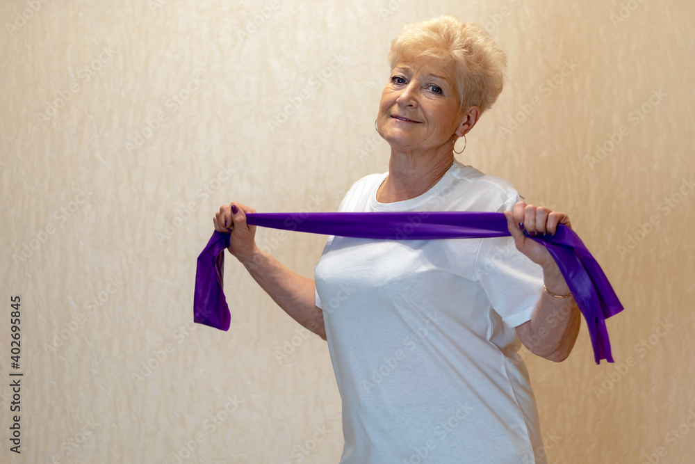 Portrait of a beautiful and mature woman. Sports at home. Portrait of a beautiful and mature woman. Sports at home.