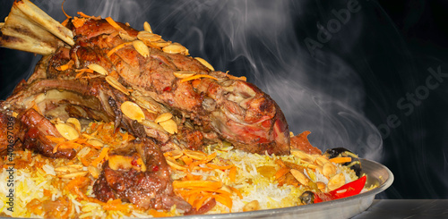 Mandi is a traditional dish from Yemen of meat, rice, and spices. It is now very popular in other areas of the Arabian Peninsula, and it is also common in Egypt and Levant and Turkey.