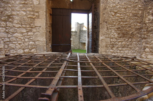 Detail of the grate of the ancient fifteenth-century well located in the courtyard of the Piccolomini Castle in Capestrano in Abruzzo photo