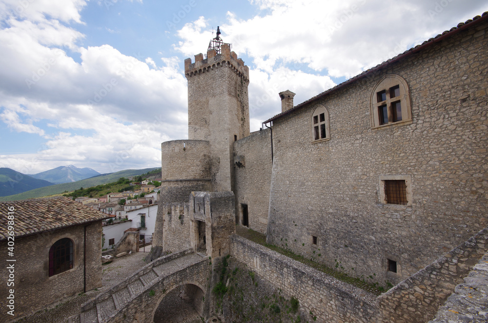 The courtyard of the Piccolomini Castle and the majestic square medieval tower