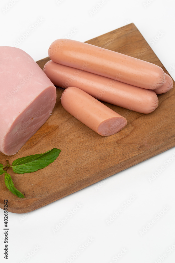 Turkey ham and sausage on white background Turkey ham and sausage on white background