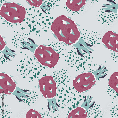 Seamless creative pattern with pale pink pitahaya silhouettes random print. Background blue with splashes.