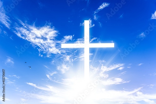 Photography The cross of God in the rays of the sun. Background of religions