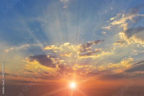 Light through the clouds, Sunbeams or Rays breaking through the dark clouds at sunset, hope , prayer god’s mercy and trace, beautiful spectacular conceptual mediation background,