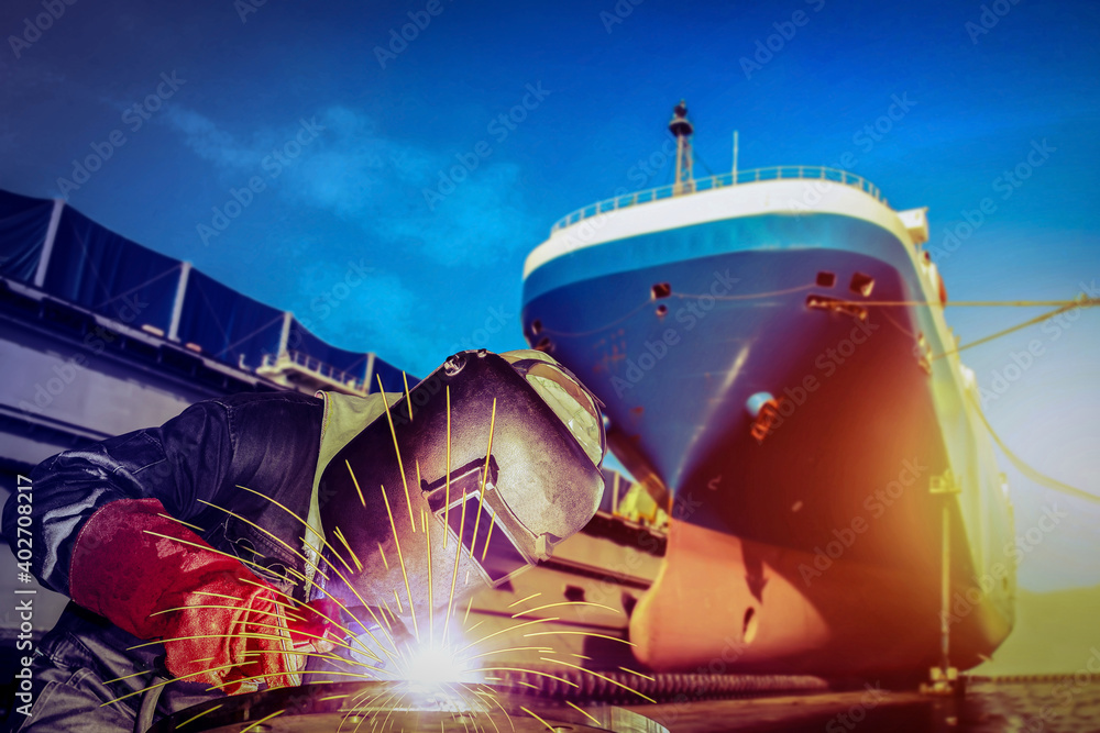 Welding MIG worker with spark weld factory at shipbuilding and ship ...