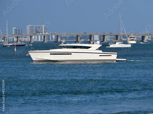 Yacht slowly cruising on Biscayne Bay,Miami Beach,Florida © Wimbledon