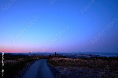 road on the totenåsen hills in evening