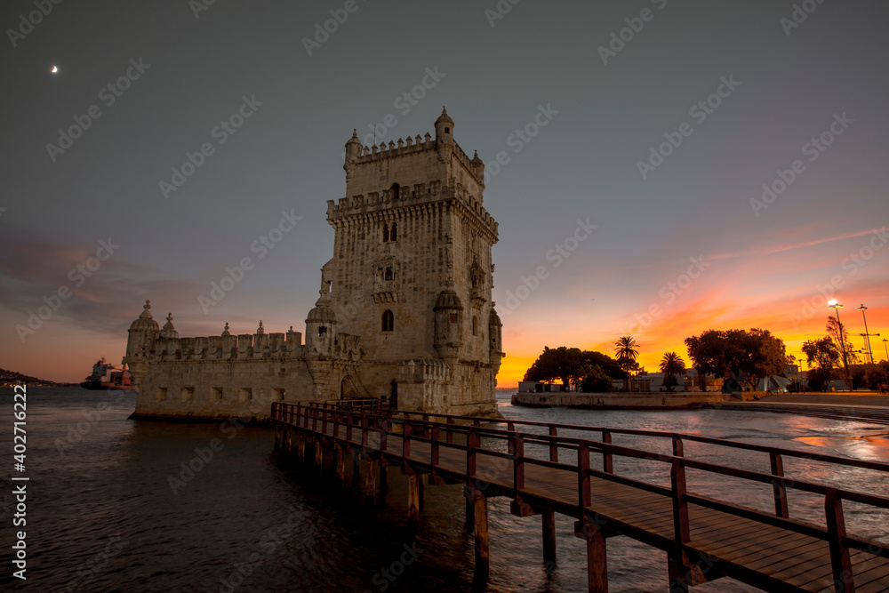 view of the historic Belem tower located in Lisbon in Portugal. It is a fortified tower declared a UNESCO World Heritage Site and being the symbol of the city it is highly appreciated by tourists.