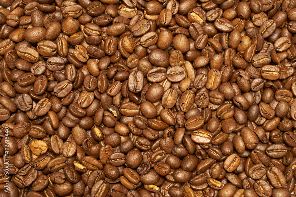 Fototapeta premium Roasted coffee beans as a background. Kitchen concept.