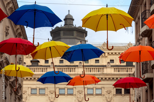 Lviv. Multi-colored umbrellas over the street. © pillerss