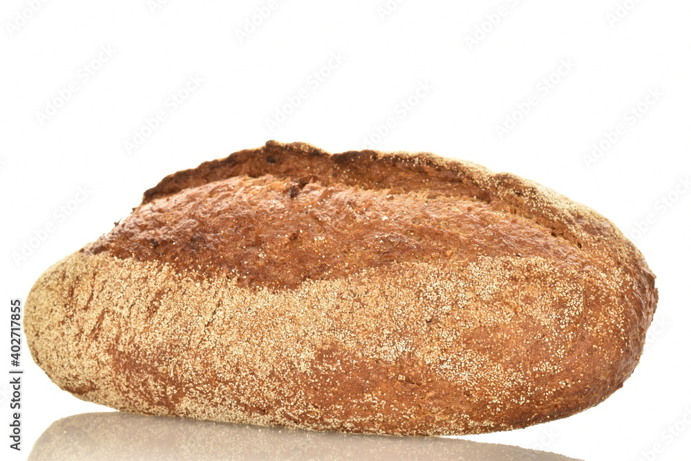 One loaf of aromatic buckwheat bread, close-up, isolated on white. One loaf of aromatic buckwheat bread, close-up, isolated on white.