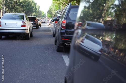 Fototapeta Naklejka Na Ścianę i Meble -  Cars in traffic jam on city street