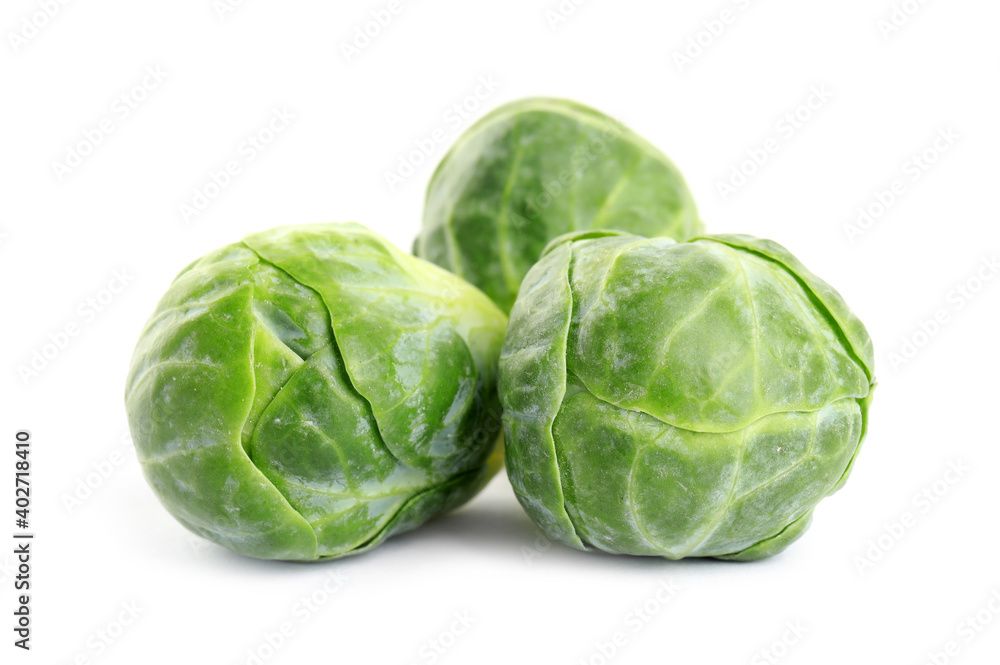 Fresh tasty Brussels sprouts isolated on white Fresh tasty Brussels sprouts isolated on white