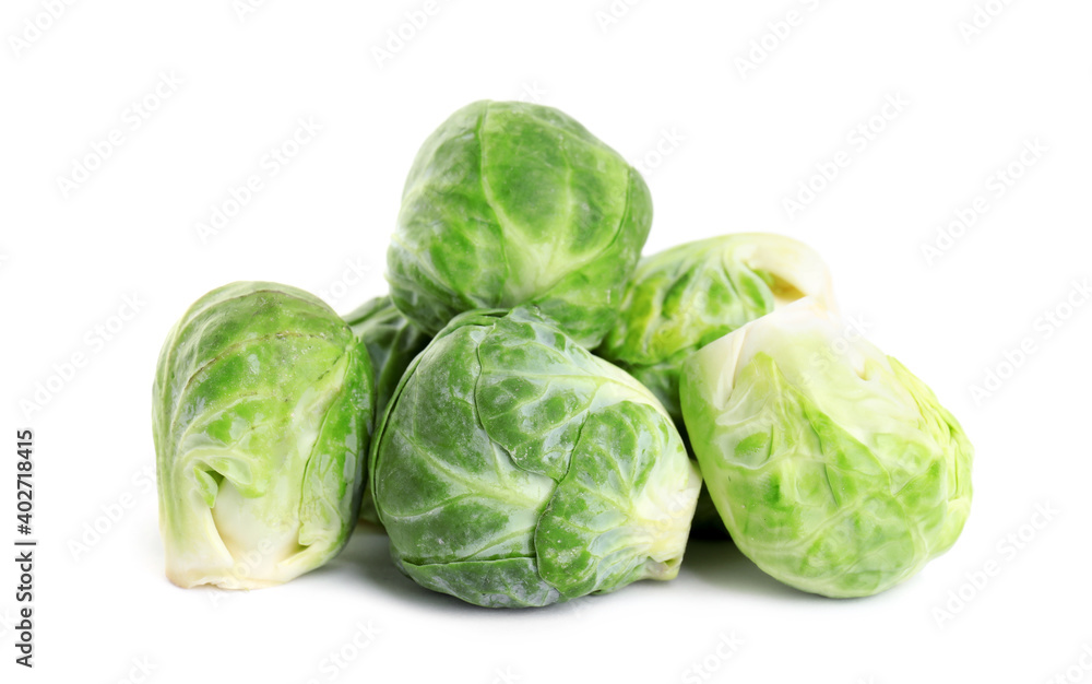 Pile of fresh Brussels sprouts isolated on white Pile of fresh Brussels sprouts isolated on white