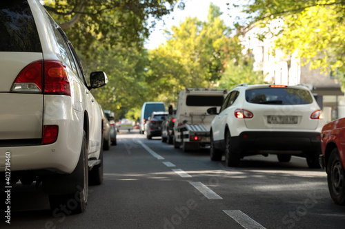 Cars in traffic jam on city street © New Africa