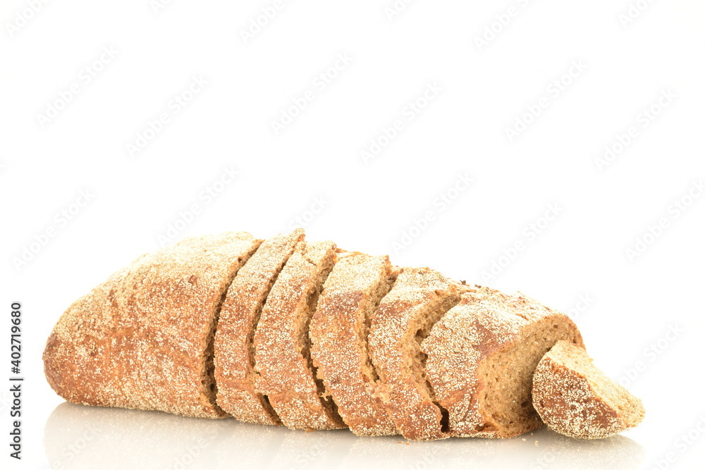 One loaf of sliced, flavored buckwheat bread, close-up, isolated on white. One loaf of sliced, flavored buckwheat bread, close-up, isolated on white.
