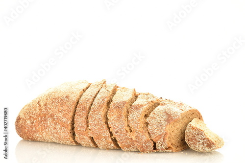 One loaf of sliced, flavored buckwheat bread, close-up, isolated on white.