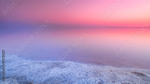 salt shore of pink lake, sunset