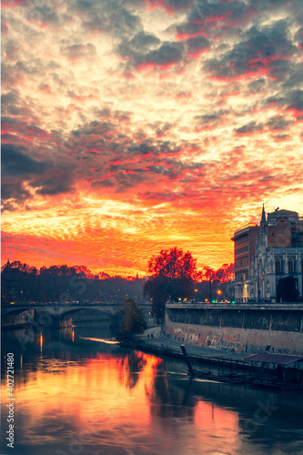 sunset over the river Tiber in Rome Italy