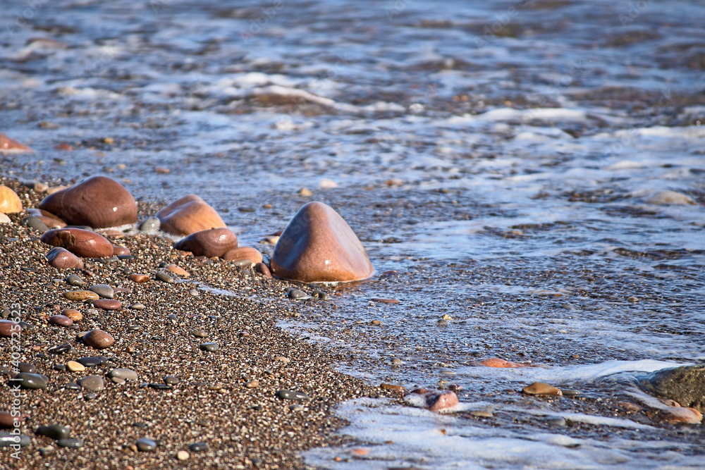 Set of rocks on the shore of the beach Set of rocks on the shore of the beach
