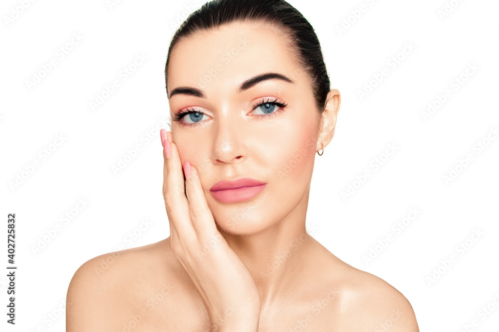 Girl's face on a white background. Hand near the face. A gentle smile..