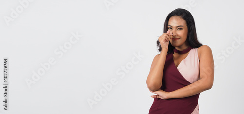 Asian sexy woman doing mini heart hand sign or Finger Heart isolated on white background.She have tan skin ,show love concept.