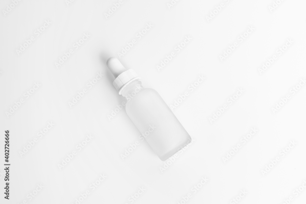 Hyaluronic acid bottle on a light background.. Hyaluronic acid bottle on a light background..