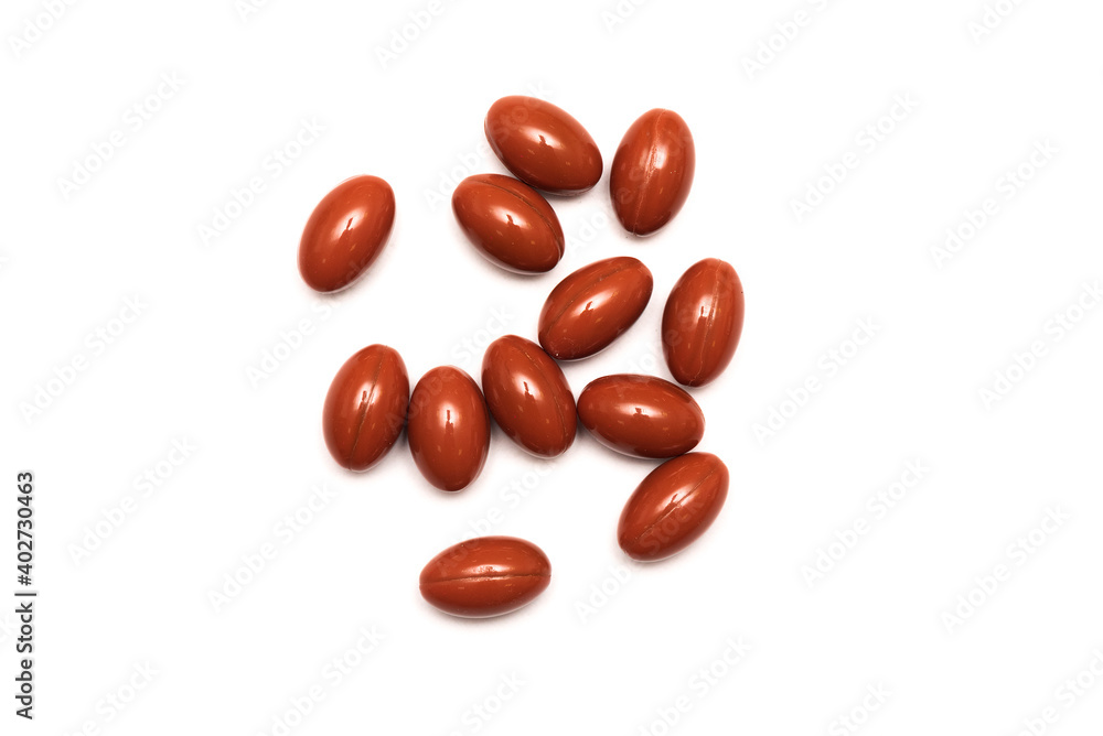 Brown pills isolated on the white background. Brown pills isolated on the white background.