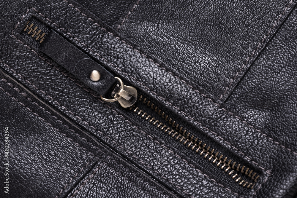 Blacl leather textured background with metal zipper Blacl leather textured background with metal zipper