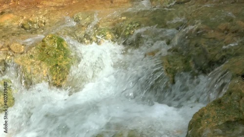 A small stream in the mountains 4K photo