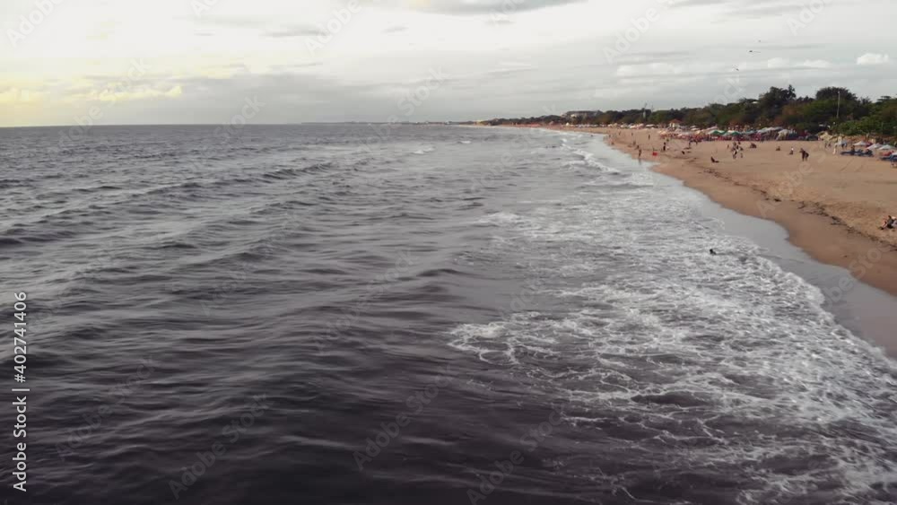 Fly over the beach with stunning ocean views Fly over the beach with stunning ocean views