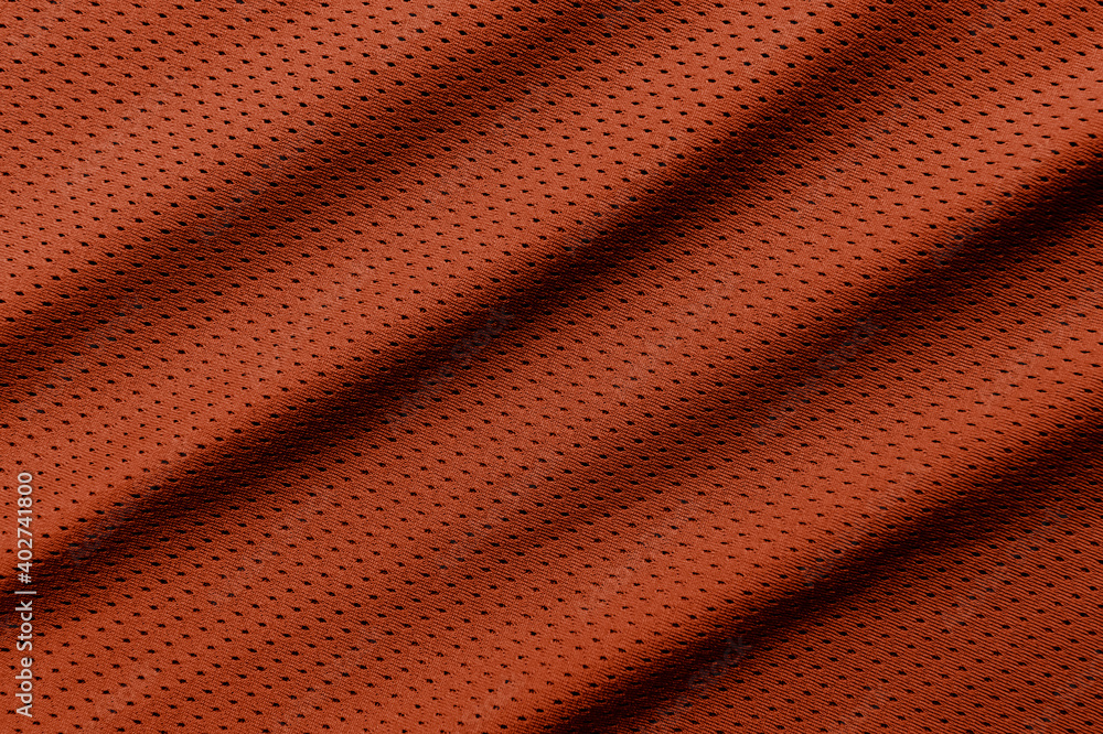 Fototapeta premium Orange football, basketball, volleyball, hockey, rugby, lacrosse and handball jersey clothing fabric texture sports wear background