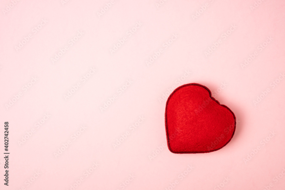 Soft red heart on pink background. Valentine's day template. Soft red heart on pink background. Valentine's day template.