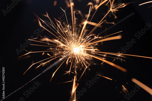 Wallpaper Mural Bengal fire. New year sparkler candle isolated on black background Torontodigital.ca