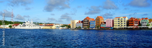 The panoramic view of the colorful buildings along the St Anna Bay during the day near Willemstad, Curacao 
